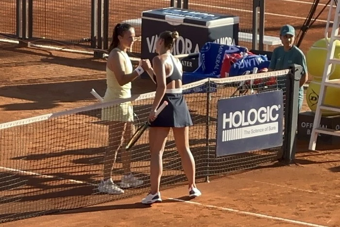 Kostiuk supports Kasatkina after the match