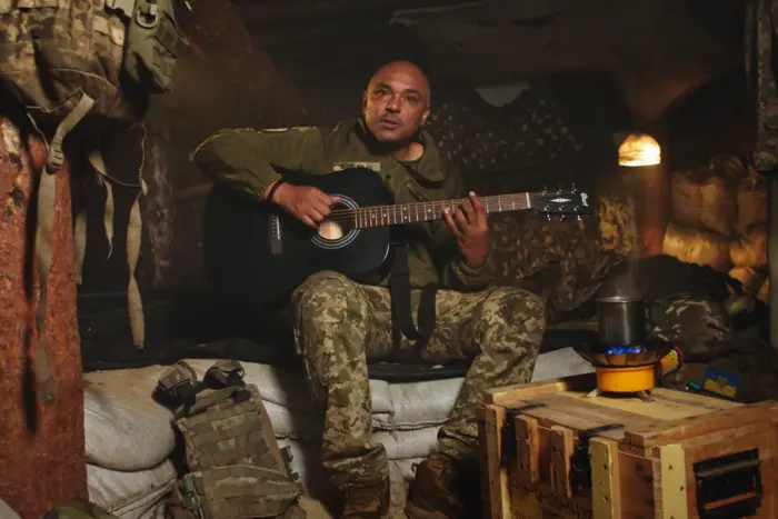 A soldier sings a song for his mother